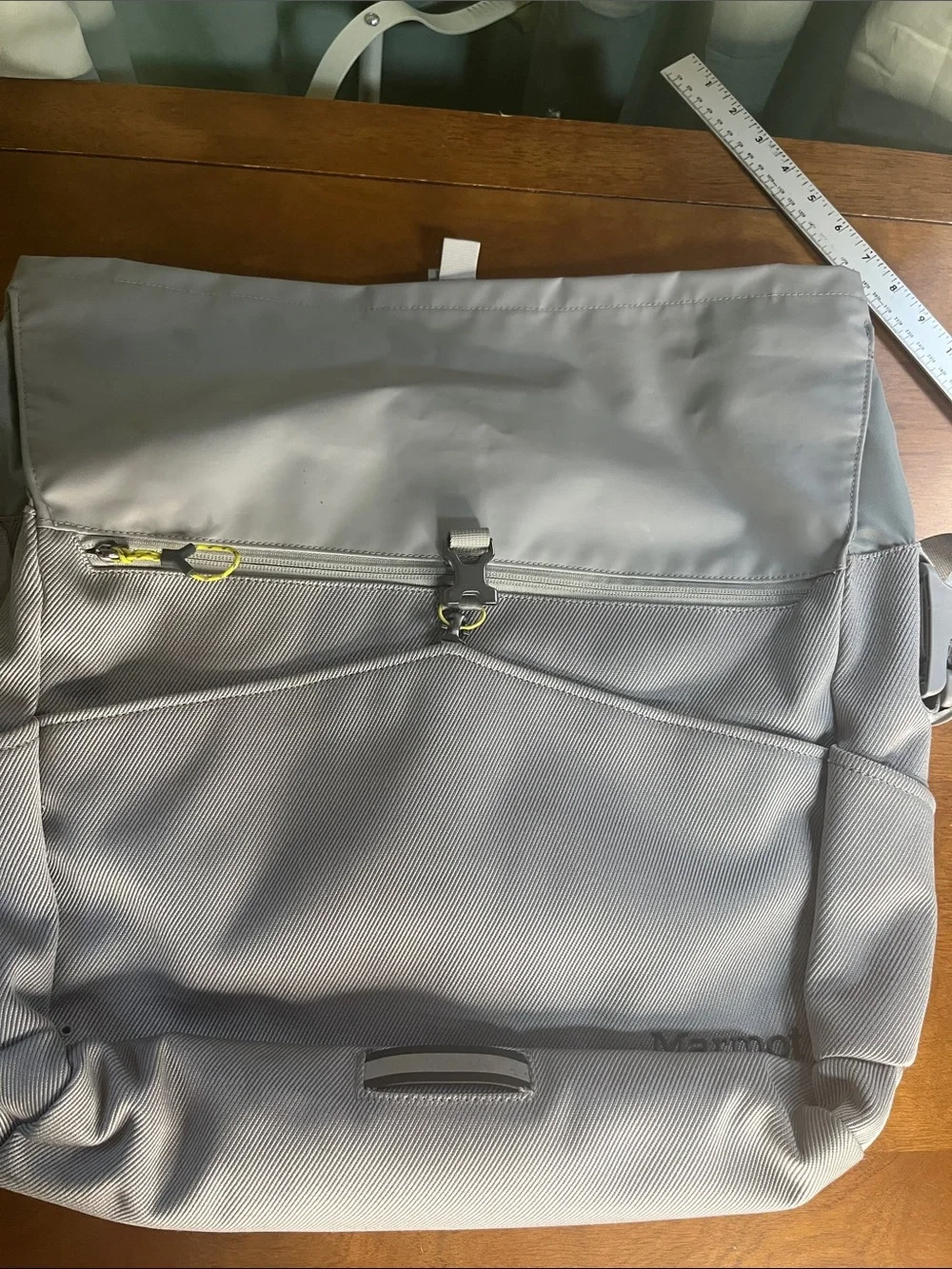 Marmot Light Gray Roll-Top Laptop Messenger Bag with Yellow Accents